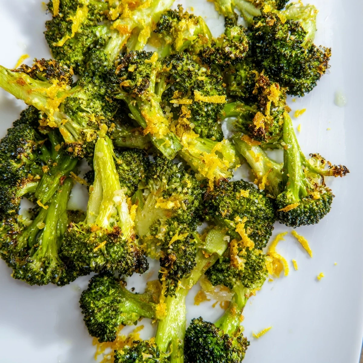 Golden-brown Lemon Garlic Roasted Broccoli glistens after roasting, ready for a delicious, healthy side.