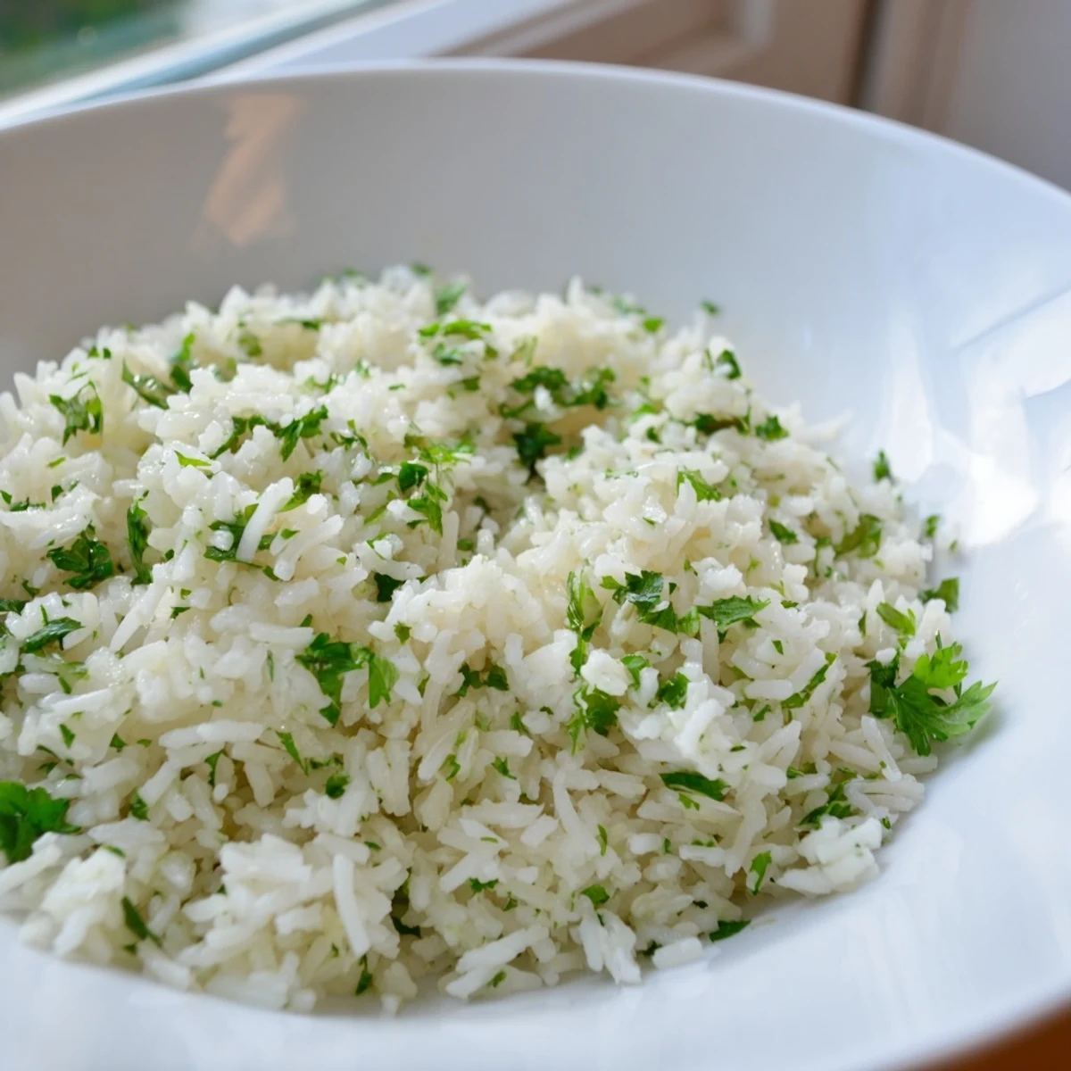 Fluffy cilantro lime rice, bright green with cilantro, is perfect alongside a flavorful taco dinner.