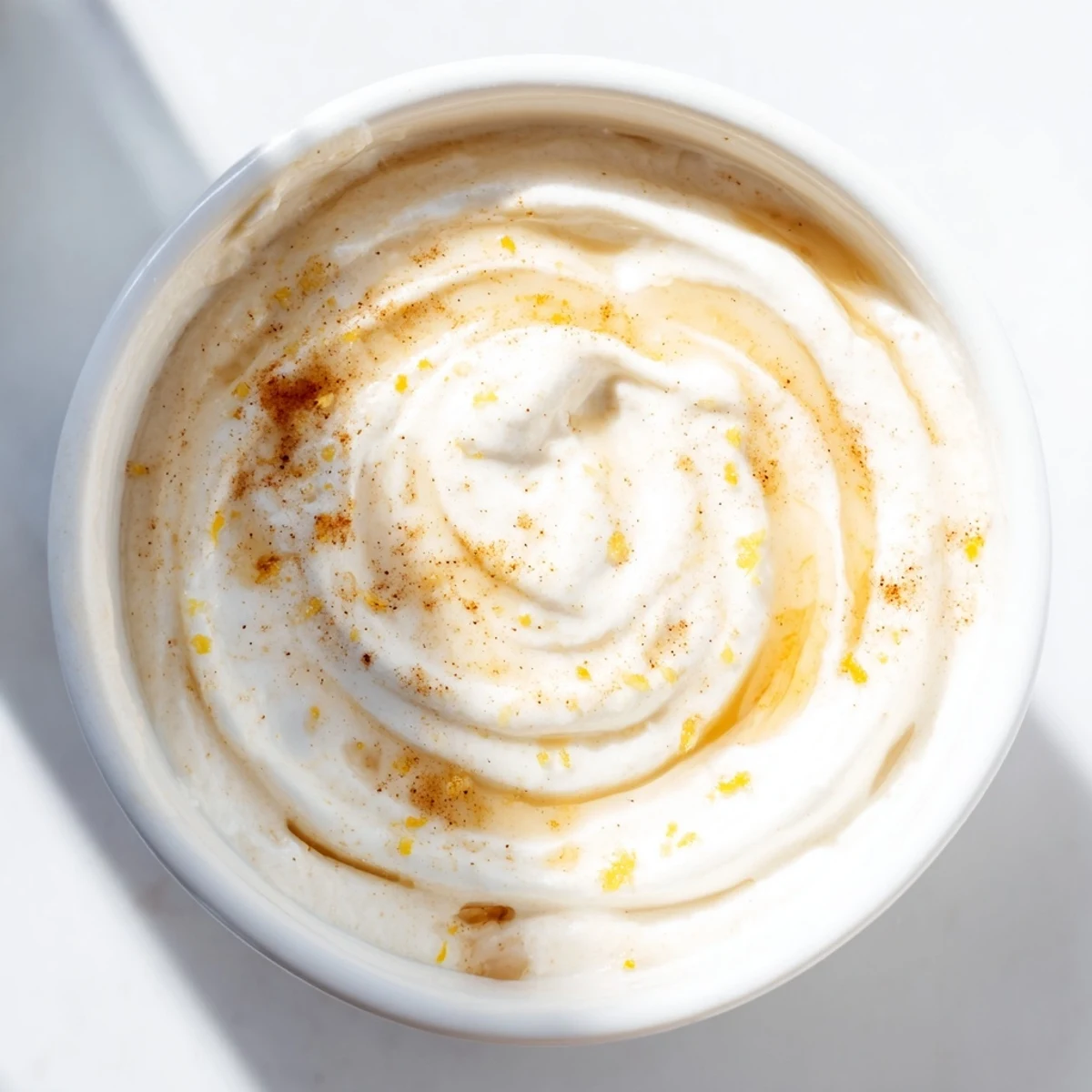 Tangy Greek yogurt fruit dip, a refreshing dessert, perfect with a variety of fresh fruit slices.