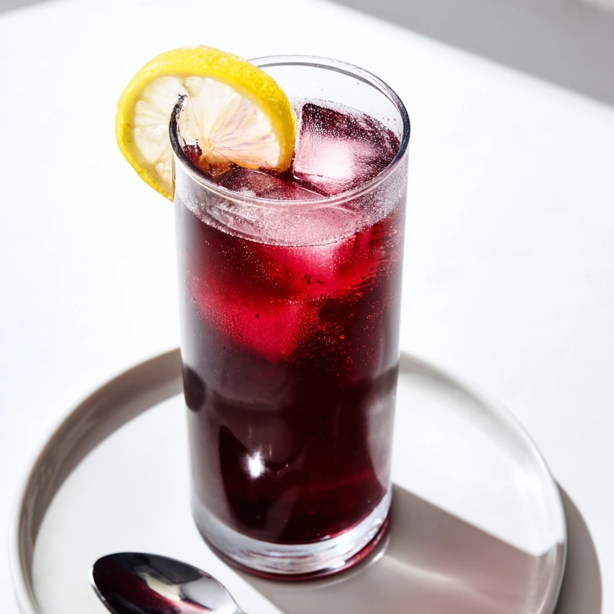 Refreshing Sleepy Girl Mocktail with bubbly sparkling water, a healthy and subtly sweet bedtime beverage.