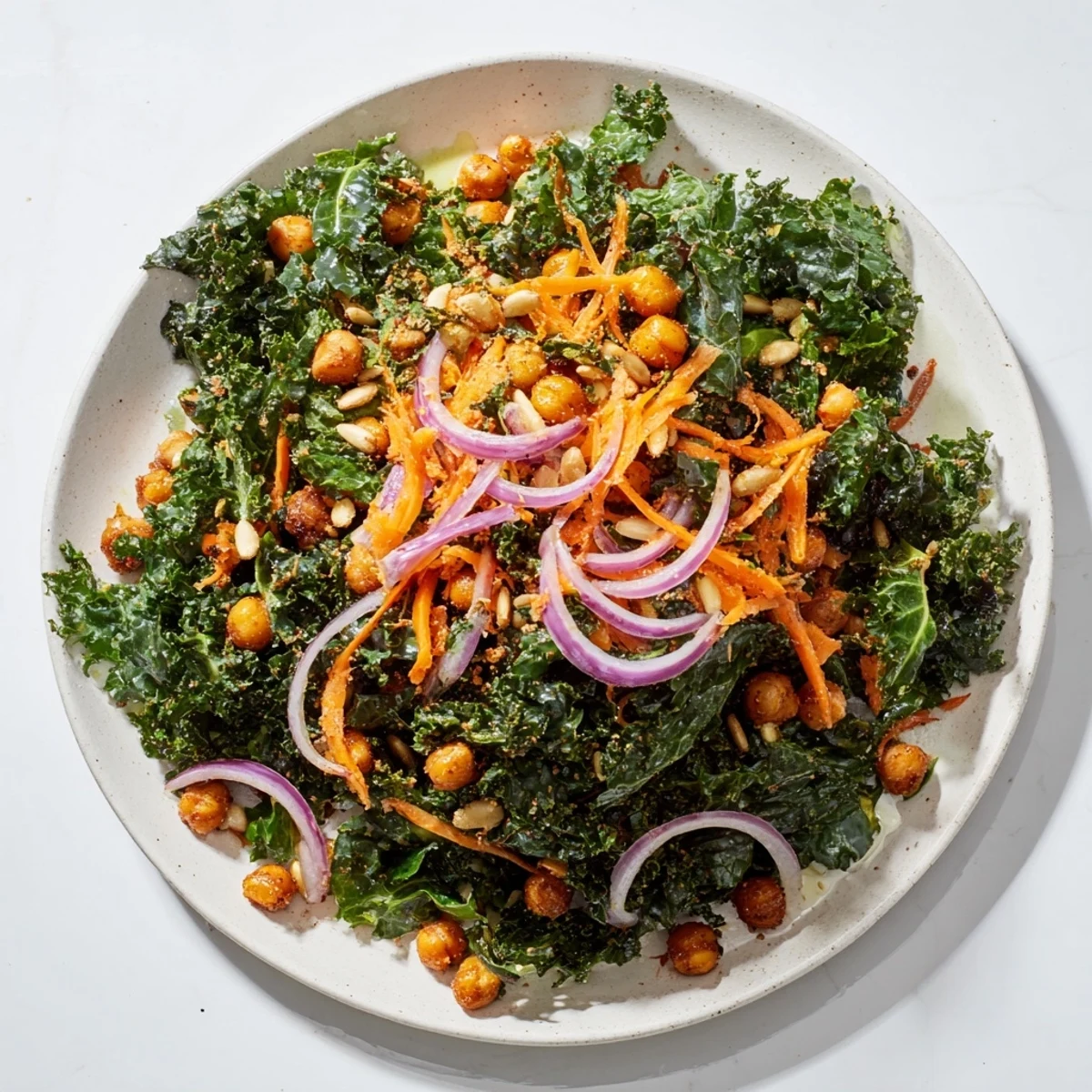 Enjoy a close-up of this delicious Kale Salad with Roasted Chickpeas, perfect for a light, flavorful meal.