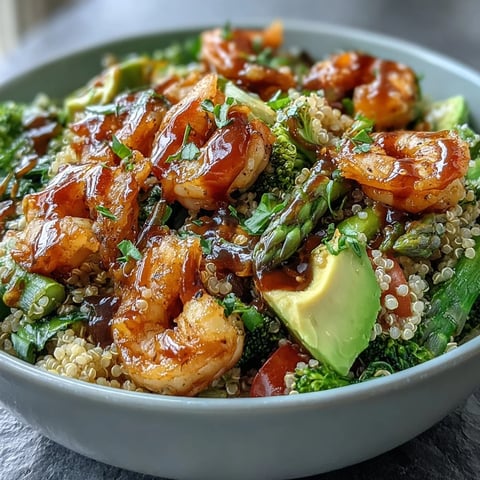 Vibrant Detox Buddha Bowl with Shrimp, showcasing colorful veggies, creamy avocado, and plump shrimp.