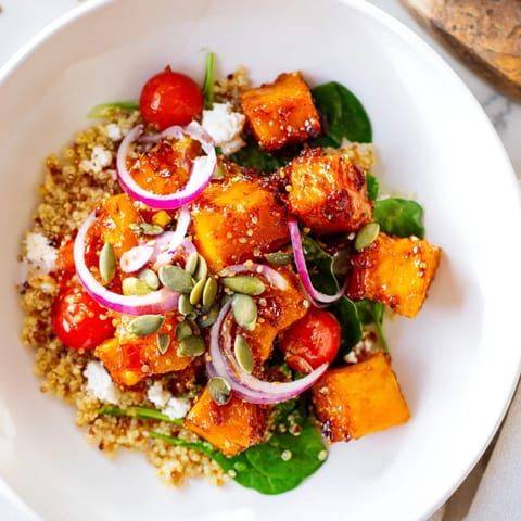 Enjoy a healthy and delicious Golden Honey-Roasted Butternut Squash Bowl recipe with colorful, vibrant fresh ingredients.